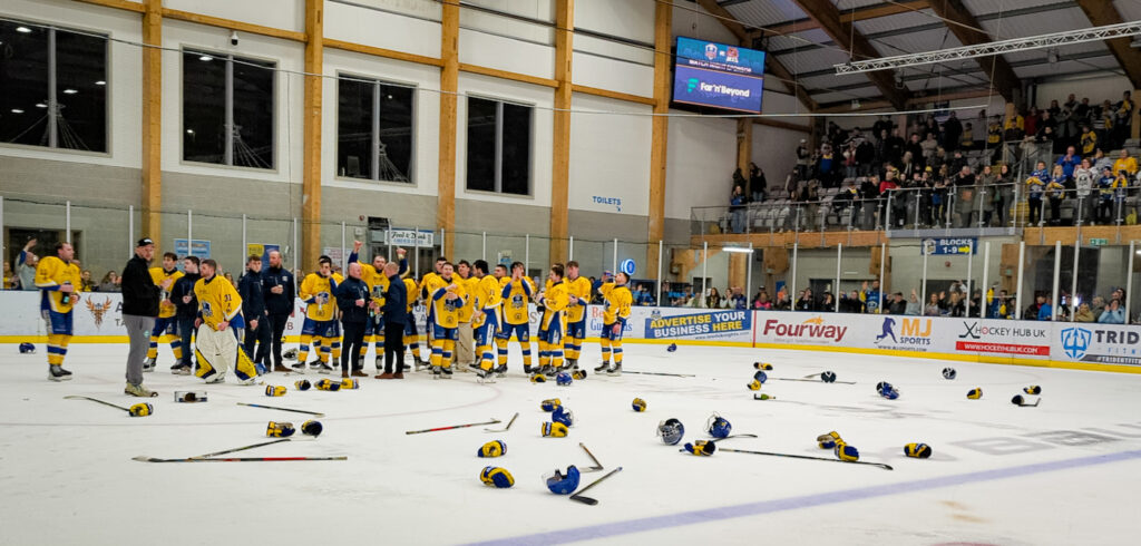 The Leeds Knights Ice Hockey team celebrate their victory on the ice