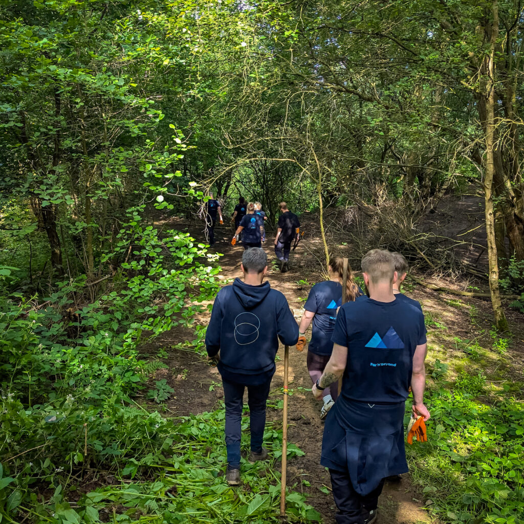 The Far'n'Beyond team walking to the site at Rothwell Country Park